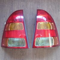 Стоп-сигналы Toyota Corolla Fielder NZE 121-124 год 2004